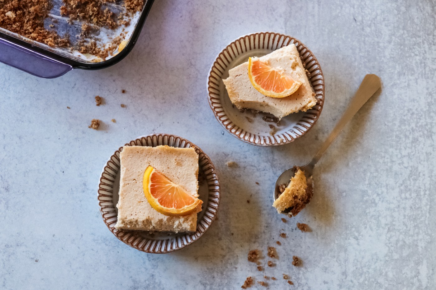 pink lemonade cheesecake bars vegan with crumbs